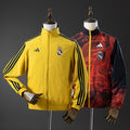 Chaqueta cortavientos reversible del Real Madrid - Amarillo y rojo