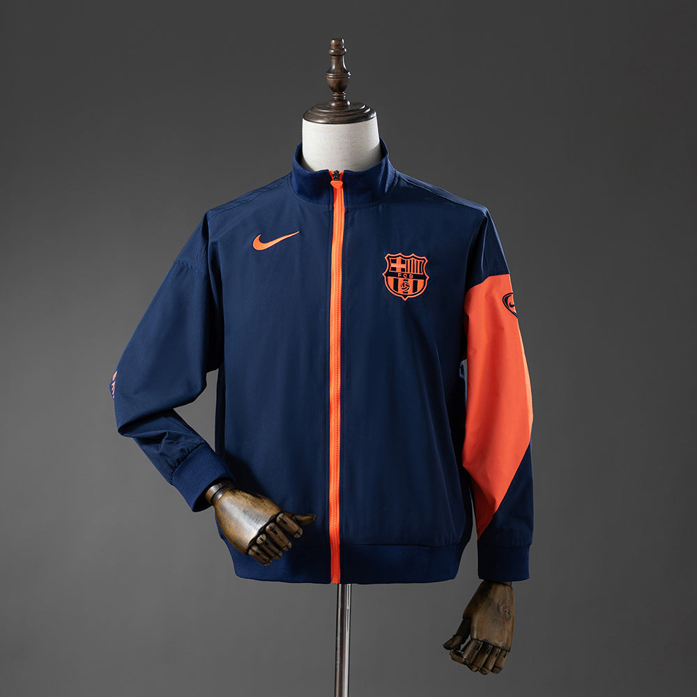 Cortavientos Barcelona - Azul marino y naranja